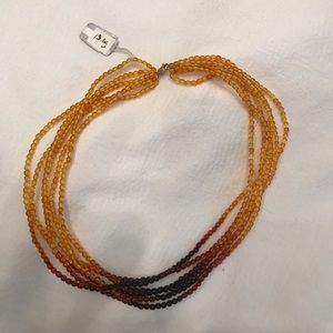 Amber beaded necklace with solid gold clasp